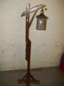 A RETRO FLOOR STANDING ADJUSTABLE STANDARD LAMP