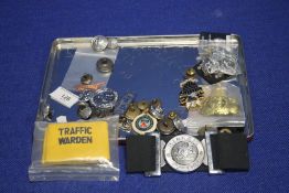 A COLLECTION OF POLICE BADGES, BUTTONS ETC
