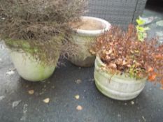 THREE LARGE RECONSTITUTED STONE GARDEN PLANTERS