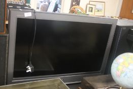 A SONY BRAVIA 32 INCH FLAT SCREEN TV PLUS REMOTE