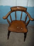AN ANTIQUE SMOKERS BOW CHAIR