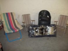 FOUR STACKING PLASTIC GARDEN CHAIRS AND THREE FOLDING DECK CHAIRS