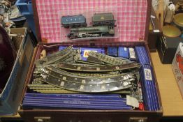 A QUANTITY OF HORNBY DUBLO TOGETHER WITH A DUCHESS OF MONTROSE ENGINE AND CARRIAGE (TRAYS NOT