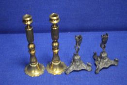 TWO PAIRS OF VINTAGE METAL CANDLESTICKS TOGETHER WITH A PAIR OF EPRERGNE BASES