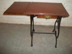 AN ANTIQUE CAST IRON SINGLE DROP LEAF SIDE TABLE