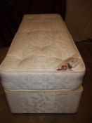 A SMALL SINGLE DIVAN BED 75CM