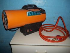A SMALL PROPANE GAS SPACE HEATER