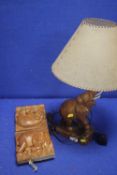 A TABLE LAMP IN THE FORM OF AN ELEPHANT TOGETHER WITH AN ELEPHANT BOOK STAND A/F