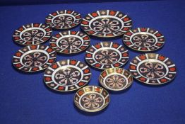 A QUANTITY OF ROYAL CROWN DERBY IMARI PATTERN PLATES AND PIN DISHES,br.
