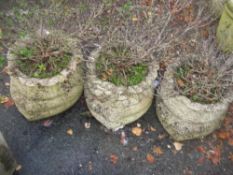 THREE CONCRETE GARDEN PLANTERS DEPICTING 3 FULL SACKS
