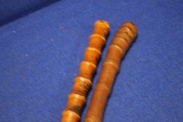 TWO ANTIQUE JAPANESE WALKING CANES WITH TYPICAL DECORATION