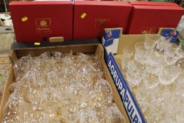 A QUANTITY OF ASSORTED CUT GLASSWARE TOGETHER WITH FOUR BOXED ROYAL BRIERLY CRYSTAL PLATES
