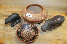 AN AFRICAN STONE HIPPO, A NORTH AMERICAN INUIT BEAR AND TWO NATIVE AMERICAN PAINTED CERAMIC POTS