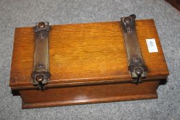A VINTAGE WOODEN TIE PRESS WITH STORAGE COMPARTMENTS