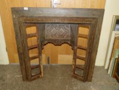 A VINTAGE CAST IRON FIRE SURROUND