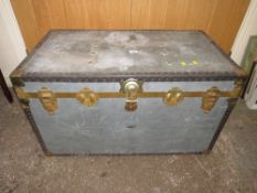 A VINTAGE METAL PACKING TRUNK WITH HANDLES