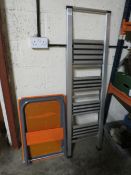 A MODERN SET OF ALLOY STEPS AND AN ORANGE TROLLEY (2)