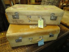 TWO VINTAGE SUITCASES WITH ORIENTAL TAGS AND STICKERS
