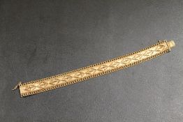 A GOLD PLATED BRIGHT CUT BRACELET