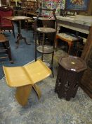 AN EASTERN OCCASIONAL TABLE, A VINTAGE OAK DUMB WAITER AND A BUTTERFLY STOOL (3)