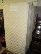 A MODERN SINGLE GUEST BED WITH TWO MATTRESSES