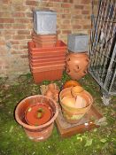 A QUANTITY OF TERRACOTTA AND PLASTIC GARDEN PLANTERS