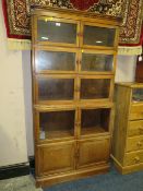 A VINTAGE OAK 'MINTY' FIVE STAGE BOOKCASE (IN ONE) H-178 W-89 CM