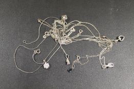 A QUANTITY OF SILVER NECKLACES
