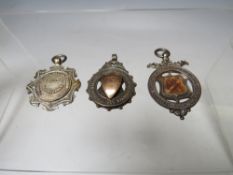 THREE EARLY 20TH CENTURY HALLMARKED SILVER FOB MEDALS, for regular or perfect attendance