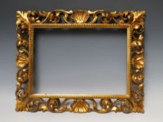 A 19TH CENTURY CARVED WOODEN FLORENTINE GILT FRAME, frame W 7.5 cm, rebate 39 x 28 cm