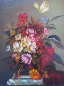 FURST (XX). Continental school, still life study of flowers on a marble shelf, signed lower right,