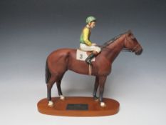A BESWICK HORSE AND JOCKEY FIGURE OF LESTER PIGGOTT ON NIJINSKY, matt finish, raised on an oval