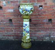 A LARGE BURMANTOFTS FIANCE JARDINIERE AND STAND, paint loss to interior and exterior of bowl,