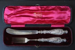 A CASED HALLMARKED SILVER HANDLED KNIFE AND FORK SET BY FRANCIS HIGGINS II - LONDON 1858, case W