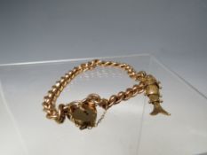 A HALLMARKED 9CT GOLD CHARM BRACELET, with single 9ct gold hallmarked charm attached, the shaped