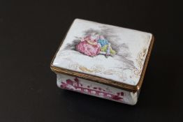 AN ANTIQUE ENAMEL GILT MOUNTED SNUFF BOX, W 6.5 cmCondition Report:damages throughout