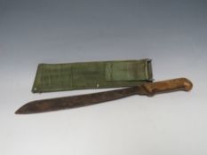 BRITISH MILITARY ISSUE ELWELL MACHETE NO KE18731 AND DATED 1953, with khaki fabric scabbard, blade L