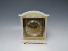 ELLIOTT FOR GARRARD & CO., a small white onyx mantel clock, square dial with silvered chapter ring
