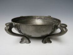 A LARGE ART NOUVEAU LIBERTY STYLE PEWTER BOWL, raised on four out swept feet, unsigned, Dia. 26