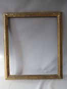 A 19TH CENTURY GOLD FRAME, with designs to inner and outer edges, in need of some restoration, frame