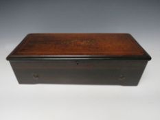 A 19TH CENTURY SWISS MUSIC BOX IN SIMULATED INLAID ROSEWOOD CASE, the 28 cm cylinder playing eight