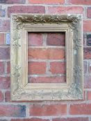 AN 18TH CENTURY DECORATIVE GOLD FRAME IN NEED OF SOME RESTORATION, frame W 9 cm, rebate 23 x 31 cm
