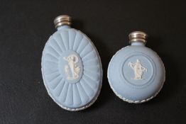 TWO HALLMARKED SILVER LIDDED WEDGWOOD JASPERWARE PERFUME BOTTLES, tallest 7.5 cm