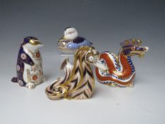 A COLLECTION OF FOUR ROYAL CROWN DERBY PAPERWEIGHTS, comprising a duck with gold stoper and a