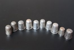 TEN SILVER THIMBLES TO INCLUDE A HALLMARKED CHARLES HORNER EXAMPLE - CHESTER 1901