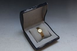 LONGINES - A CLASSIC LADIES DATE WRIST WATCH, on gold plated bracelet with guarantee from 2004,