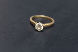 A 18 CARAT GOLD DIAMOND SOLITAIRE RING, the diamond being an estimated 0.75 carat, approx weight 3.