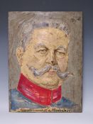 A COLOURED PORTRAIT STUDY IN RELIEF ON CAST IRON PLAQUE, of General Feldmarschall von Hindenberg,