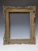 A LATE 19TH / EARLY 20TH CENTURY GOLD SWEPT FRAME, frame W 8.5 cm, rebate 41 x 57 cm