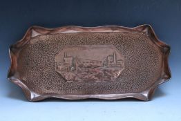 A WIDE COPPER TRAY, with decorative central vignette of a old copper mine and engine houses, hand